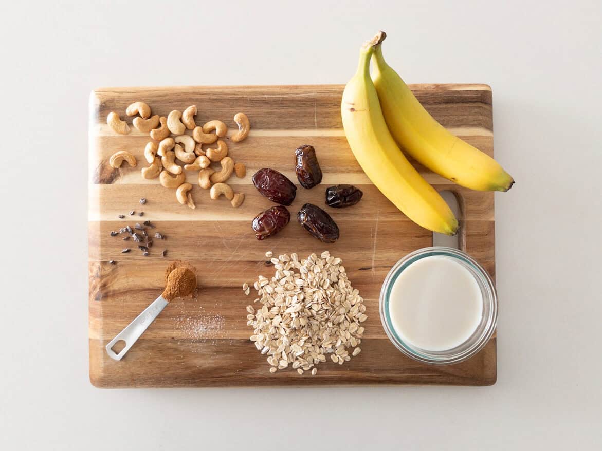 cashew date smoothie raw ingredients on cutting board